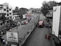 Vasai West bus stop with buses and passengers