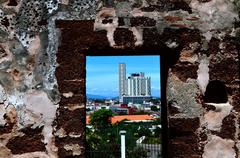 Modern Malacca through A Famosa fort window