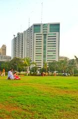 view of a nearby building from the National Museum park in Karachi