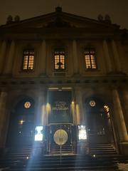 Nobel Prize Museum entrance with people walking in Stockholm