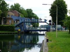 Schleuse Woltersdorf with boats and a pedestrian bridge