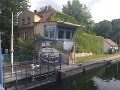 Schleuse Woltersdorf lock with boats and surrounding greenery