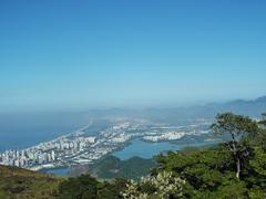 View of Barra da Tijuca with lagoons, high-rise buildings, and Recreio in the background from Pedra Bonita