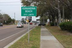 Fernandina Beach city limits sign on S 14th St NB in Nassau County, Florida