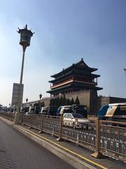 Beijing cityscape with traditional rooftops and modern buildings