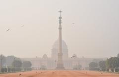 Rashtrapati Bhavan, the President's official residence in Delhi, with black kites on the ground and in the air