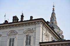 Detail of the facade of Palazzo Reale in Turin with the top of the Guarini Chapel