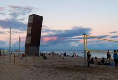 Platja de Sant Miquel beach in Barcelona with Estel ferit sculpture by Rebecca Horn in the background