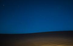 Cold desert with starry night sky