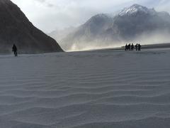 Katpana Cold Desert in Skardu with snow-covered mountains and a river