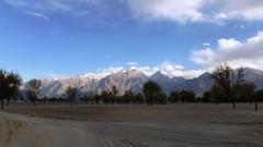 Skardu Desert with a view of mountains and blue sky