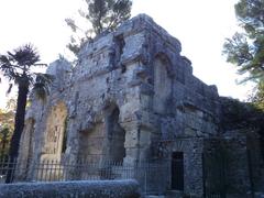 Le Temple De Diane in Nimes, France, surrounded by greenery