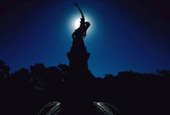 Solar eclipse viewed from Ángel Caído Fountain in El Retiro Park, Madrid