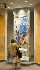 John F. Kennedy Presidential Library with a section of the Berlin Wall on display