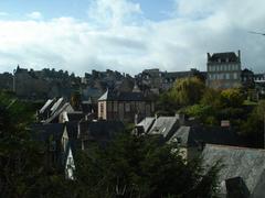 Scenic view of Dinan with historic buildings and a river in November 2011