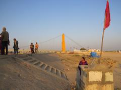 Scenic view of Dwaraka coast with boats and vibrant sunset