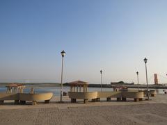 Dwaraka shoreline during sunset with ancient temples in background