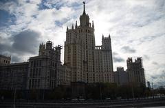 Moscow cityscape showcasing modern skyscrapers and historical buildings under a clear sky