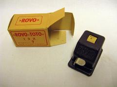 ROVO Toto dice machine with yellow product packaging