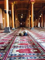 man praying in Old Jama Masjid Srinagar