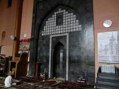 Mihrab of Jamia Masjid in Srinagar with 99 names of Allah inscribed above