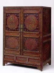 Ming dynasty lacquer cabinet with dragon and cloud motifs