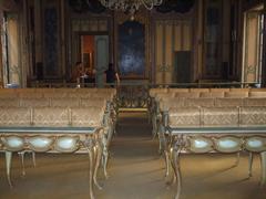 interior of Sala Martorana with frescoes and chandeliers in Palermo