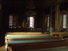 interior of Sala Martorana with ornate ceilings and chandeliers