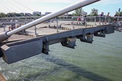 Seesaw mass-spring-damper system on Passerelle des Deux-Rives