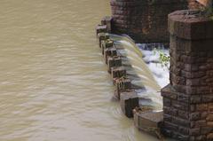 Aruvikkara Dam in Thiruvananthapuram, Kerala with a serene lake and arched bridge