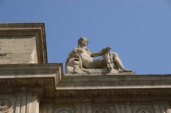 Porta Garibaldi city gate with an allegorical statue in Milan, Italy