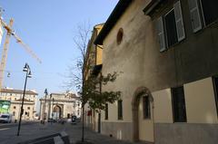 Corso Garibaldi near Santa Maria Incoronata church in Milan, with Porta Garibaldi gate in the background