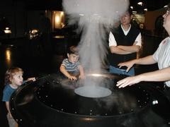 Person blowing smoke at the Exploratorium