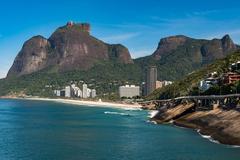 Scenic coastal view with Pedra da Gávea in the background