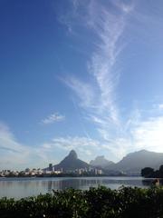 Blue sky and calm water with Dois Irmãos hill in the background