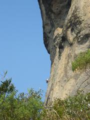 Man climbing rock face