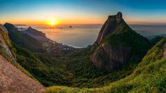 Panoramic view of the rising sun and Pedra da Gávea rock in Rio de Janeiro, Brazil