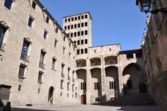 Barcelona Plaça del Rei with Palau del Lloctinent on the left, Chapel of Santa Àgata on the right, and Saló del Tinell with Mirador del Rei Martí in the center