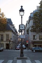 Street clock at the end of the Archevêché Bridge, Paris