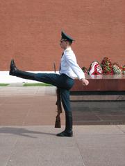 Changing guards in Moscow with historical buildings in the background