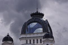 Palais Lumière thermal building in Evian-les-Bains with yellow and white stone façade, restored dome, now a museum and convention space