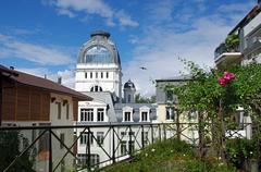 Le Palais Lumière in Evian-les-Bains with its yellow and white stone façade and restored dome