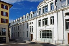 Le Palais Lumière in Évian-les-Bains with restored dome on yellow and white stone façade