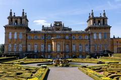 Blenheim Palace with expansive grounds and clear blue sky