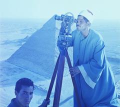 surveyors on the Khufu Pyramid with Khafre Pyramid in the background