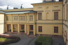 Drottningholm Palace exterior with water reflections