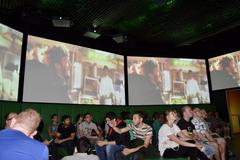 Heineken Experience building in Amsterdam with visitors outside