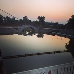 Jyotisar town pond with people