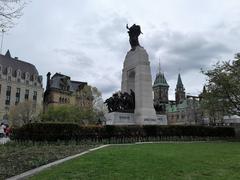 National War Memorial with soldiers and a stone archway in Ottawa, Canada