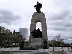 National War Memorial in Canada with a large arch, bronze sculptures, and a tall granite cenotaph